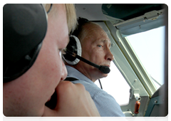 Prime Minister Vladimir Putin helping extinguish forest fires from aboard a Be-200 amphibious aircraft|10 august, 2010|18:10