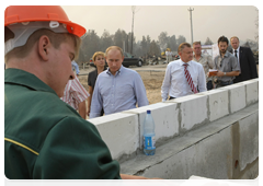 Prime Minister Vladimir Putin inspecting construction sites where houses destroyed by fire are being rebuilt in the village of Kriusha in the Ryazan Region|10 august, 2010|20:24