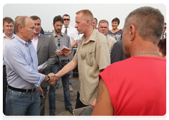 Prime Minister Vladimir Putin talking to residents of the village of Kriusha in the Ryazan Region|10 august, 2010|20:24