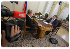 Prime Minister Vladimir Putin holding a working meeting with Federal Antimonopoly Service Head Igor Artemyev|13 august, 2010|13:05