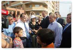 Prime Minister Vladimir Putin inspects the construction of housing in the Podolsk District of the Moscow Region