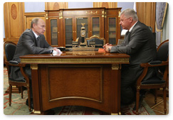 Prime Minister Vladimir Putin meets with Chairman of the Federation of Independent Trade Unions Mikhail Shmakov