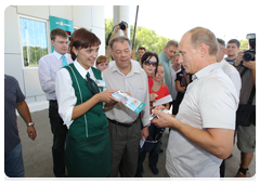 Prime Minister Vladimir Putin stopping at a petrol station on the road from Khabarovsk to Chita|27 august, 2010|14:50
