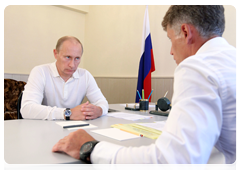 Prime Minister Vladimir Putin at a working meeting with Amur Region Governor Oleg Kozhemyako during his tour of the Far Eastern Federal District|28 august, 2010|15:35