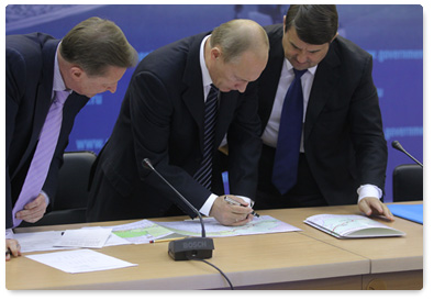 Prime Minister Vladimir Putin chairs a meeting in Chita to discuss road construction