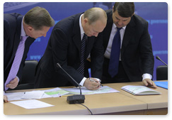 Prime Minister Vladimir Putin chairs a meeting in Chita to discuss road construction