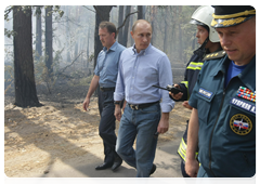 Prime Minister Vladimir Putin at the Emergencies Ministry camp in the Voronezh Region|4 august, 2010|13:37