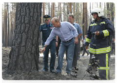 Prime Minister Vladimir Putin at the Emergencies Ministry camp in the Voronezh Region|4 august, 2010|13:37