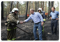 Prime Minister Vladimir Putin at the Emergencies Ministry camp in the Voronezh Region|4 august, 2010|13:37