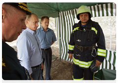 Prime Minister Vladimir Putin at the Emergencies Ministry camp in the Voronezh Region|4 august, 2010|14:25