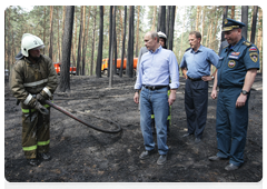 Prime Minister Vladimir Putin at the Emergencies Ministry camp in the Voronezh Region|4 august, 2010|14:51