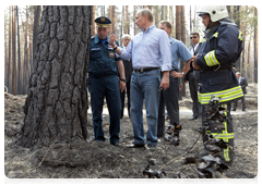 Prime Minister Vladimir Putin at the Emergencies Ministry camp in the Voronezh Region|4 august, 2010|14:51