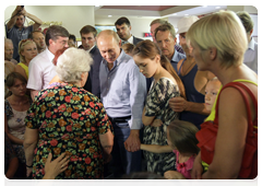 Prime Minister Vladimir Putin visiting temporary shelters for fire victims in the Voronezh Region|4 august, 2010|15:31