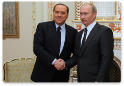 Prime Minister Vladimir Putin meets with Italian Prime Minister Silvio Berlusconi