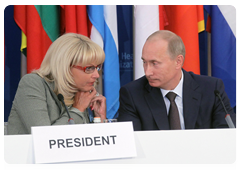 Prime Minister Vladimir Putin and Minister of Healthcare and Social Development Tatyana Golikova at the 60th session of the WHO Regional Committee for Europe|13 september, 2010|14:40
