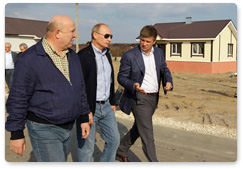 Prime Minister Vladimir Putin visits the village of Verkhnyaya Vereya, which was damaged by wildfires in July 2010, during his working visit to the Nizhny Novgorod Region