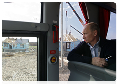 Prime Minister Vladimir Putin in the village of Verkhnyaya Vereya, which was damaged by wildfires in July 2010, during his working visit to the Nizhny Novgorod Region|15 september, 2010|17:32