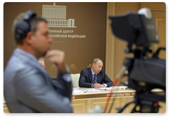 Prime Minister Vladimir Putin holds a video conference on relief efforts in regions affected by the summer’s wildfires