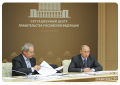 Prime Minister Vladimir Putin and Minister of Regional Development of the Russian Federation Viktor Basargin at a video conference on relief efforts in the regions affected by the summer’s wildfires|16 september, 2010|14:14