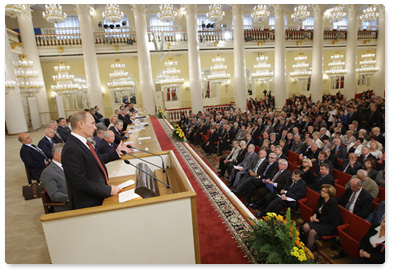 Prime Minister Vladimir Putin addresses a meeting of the General Council of the Federation of Independent Trade Unions of Russia