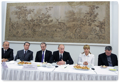 Prime Minister Vladimir Putin meets with members of the Mariinsky Theatre’s Board of Trustees during an official visit to St. Petersburg