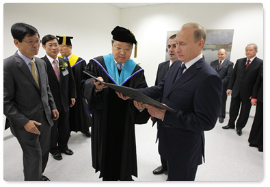 Prime Minister Vladimir Putin receives an honorary degree in Judo from Yong In University in South Korea