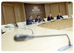 Prime Minister Vladimir Putin during a video conference on relocating tenants living in dilapidated and hazardous housing in Tynda|24 september, 2010|16:39