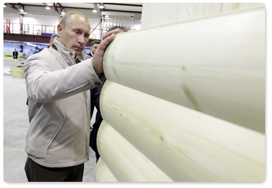 Prime Minister Vladimir Putin visits the Syktyvkar industrial complex which specializes in woodworking and the construction of wooden buildings