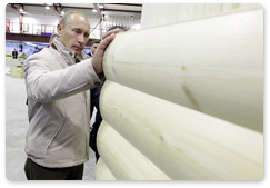 Prime Minister Vladimir Putin visits the Syktyvkar industrial complex which specializes in woodworking and the construction of wooden buildings