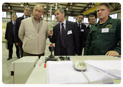 Prime Minister Vladimir Putin visiting the Syktyvkar industrial complex which specializes in woodworking and the construction of wooden buildings|28 september, 2010|19:36