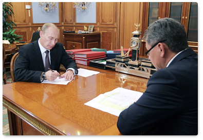 Prime Minister Vladimir Putin holds a meeting with Emergencies Minister Sergei Shoigu