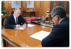 Prime Minister Vladimir Putin holds a meeting with Emergencies Minister Sergei Shoigu