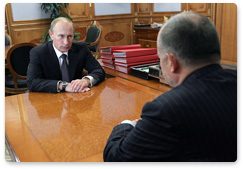 Prime Minister Vladimir Putin meets with Chairman of the Board of Novolipetsk Steel (NLMK) Vladimir Lisin