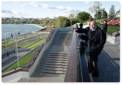 Prime Minister Vladimir Putin inspects the embankment of the Izhevsk water reservoir