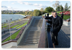 Prime Minister Vladimir Putin inspects the embankment of the Izhevsk water reservoir