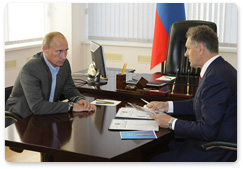 Prime Minister Vladimir Putin and the president of Udmurtia, Alexander Volkov, discuss measures to bolster local industries and support agriculture