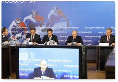 Prime Minister Vladimir Putin chairs a meeting on Russia’s sport and fitness strategy through 2020 in Novogorsk, outside Moscow