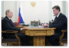 Russian Prime Minister Vladimir Putin holds a working meeting with Nikolai Shvets, CEO of IDGC Holding (Interregional Distribution Grid Companies)