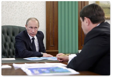 Prime Minister Vladimir Putin holds a working meeting with Transport Minister Igor Levitin