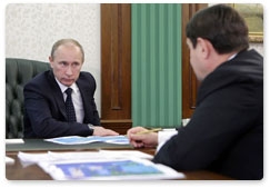 Prime Minister Vladimir Putin holds a working meeting with Transport Minister Igor Levitin