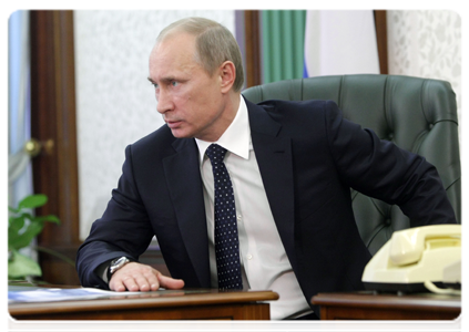 Prime Minister Vladimir Putin at a working meeting with Transport Minister Igor Levitin|4 january, 2011|16:29