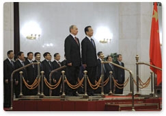 Prime Minister Vladimir Putin, on a working visit to China, holds limited attendance talks with Chinese Premier Wen Jiabao