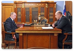 Prime Minister Vladimir Putin meets with Federal Tax Service head Mikhail Mishustin