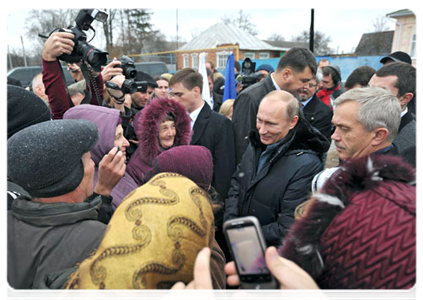 Prime Minister Vladimir Putin meeting with local residents during his visit to the village of Golovchino|15 november, 2011|19:47