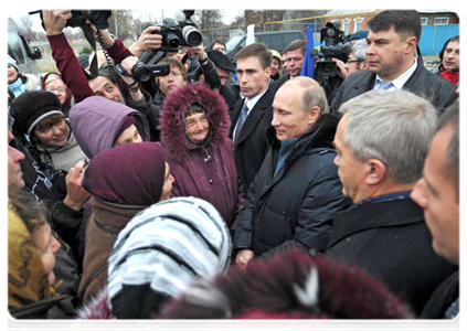 Prime Minister Vladimir Putin meeting with local residents during his visit to the village of Golovchino|15 november, 2011|19:47