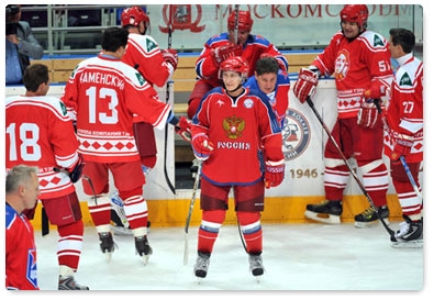 Prime Minister Vladimir Putin takes part in a hockey practice with players from USSR Ice Hockey Legends club