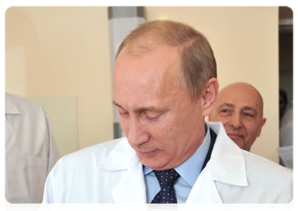 Prime Minister Vladimir Putin at the Regional Perinatal Centre in Kaliningrad. In the early hours of October 31, a baby was born here who is thought to represent the world’s 7-billionth resident|2 november, 2011|18:55