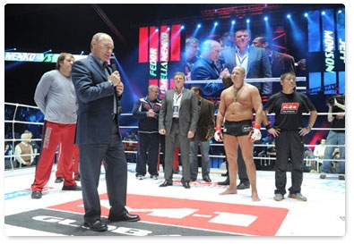 Prime Minister Vladimir Putin attends mixed martial arts matches at the M-1 Global tournament at Olimpiysky Sports Complex