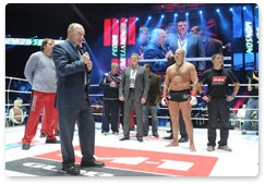 Prime Minister Vladimir Putin attends mixed martial arts matches at the M-1 Global tournament at Olimpiysky Sports Complex