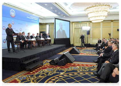 Prime Minister Vladimir Putin attending the international conference, Thinking of Taxes in a New Way|21 november, 2011|16:06